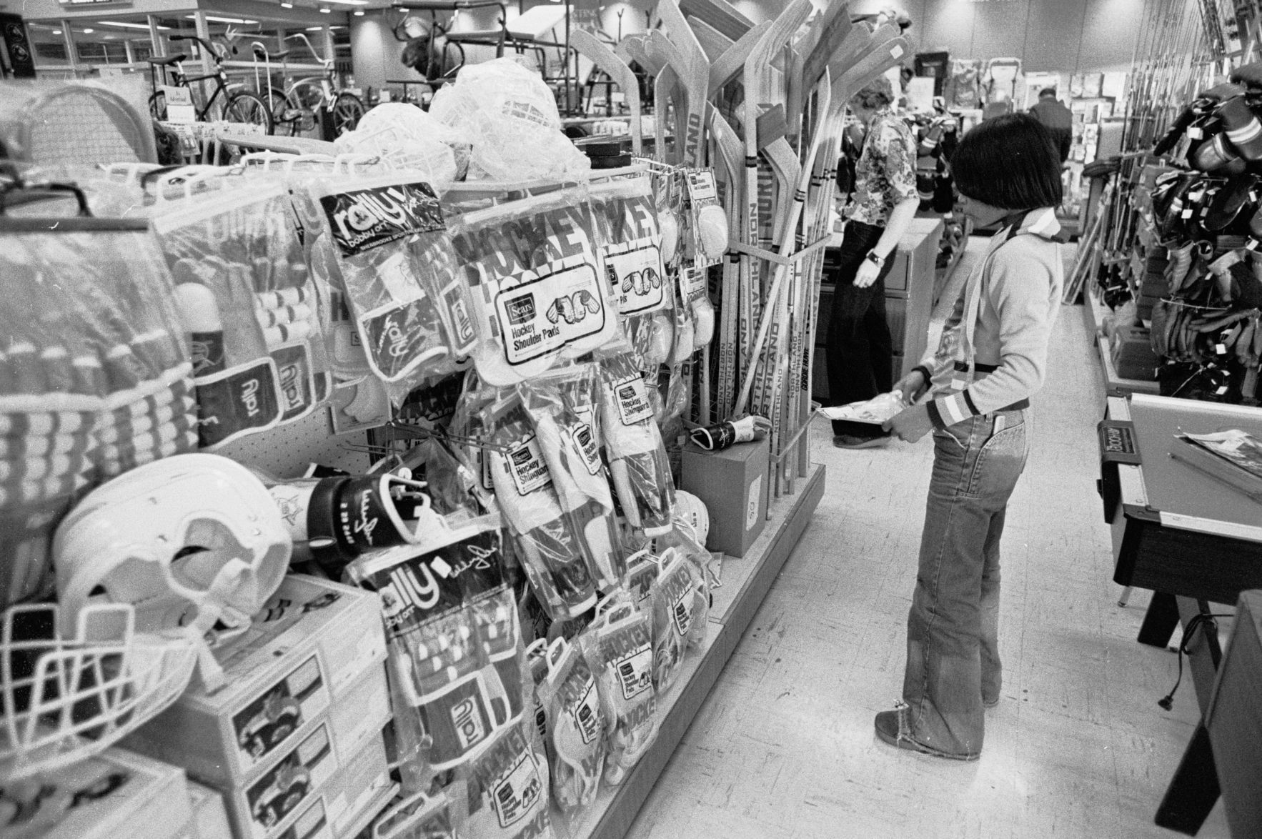 Hockey equipment for sale at Sears, November 1977